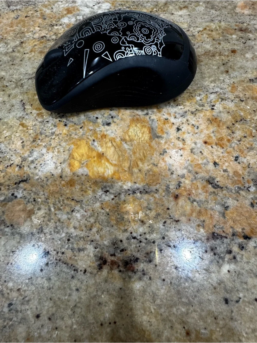 Logitech Black Wireless Mouse with White Doodle Design